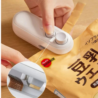 Mini Packaging Sealer-USB Rechargeable with Integrated Cutter and Vacuum Sealing