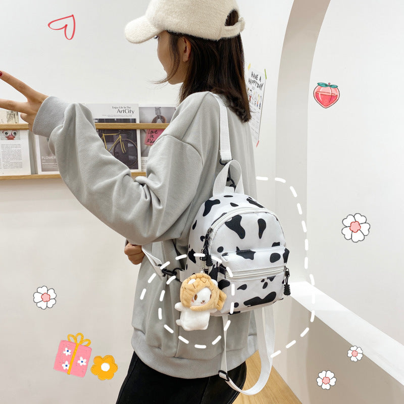 Bag Women's Bag 2026 new Backpack Dairy Cow Pattern Backpack Outdoor Travel Small Backpack Casual Backpack