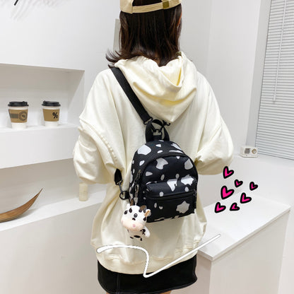 Bag Women's Bag 2026 new Backpack Dairy Cow Pattern Backpack Outdoor Travel Small Backpack Casual Backpack