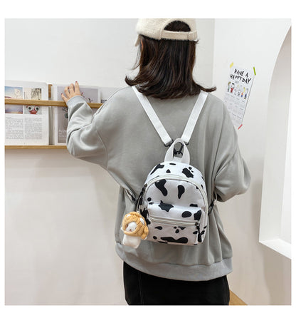 Bag Women's Bag 2026 new Backpack Dairy Cow Pattern Backpack Outdoor Travel Small Backpack Casual Backpack