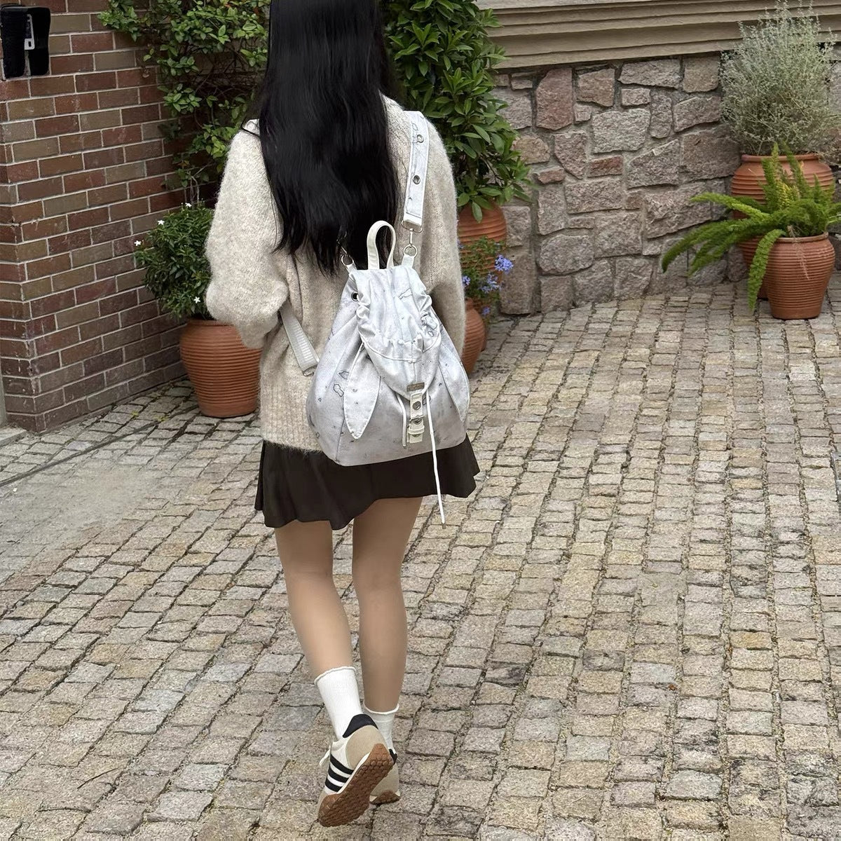 Retro Cute Rabbit Ears Backpack 2026 Niche Design Drawstring Casual Large Capacity Diagonal Backpack